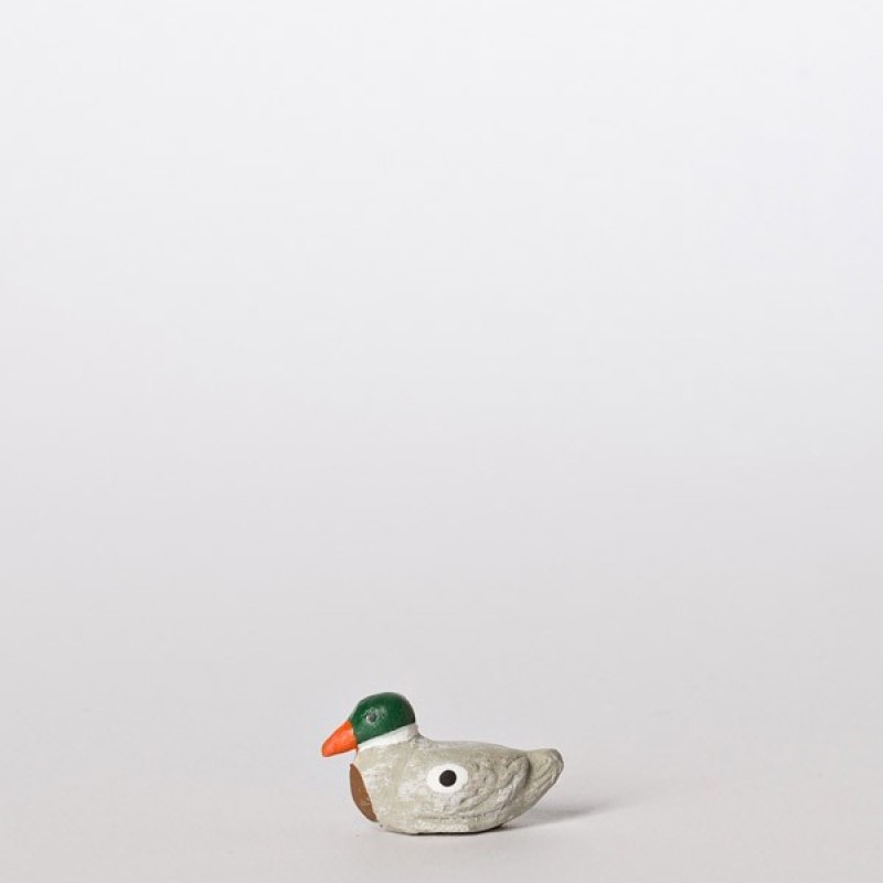 Santon le canard couché gris